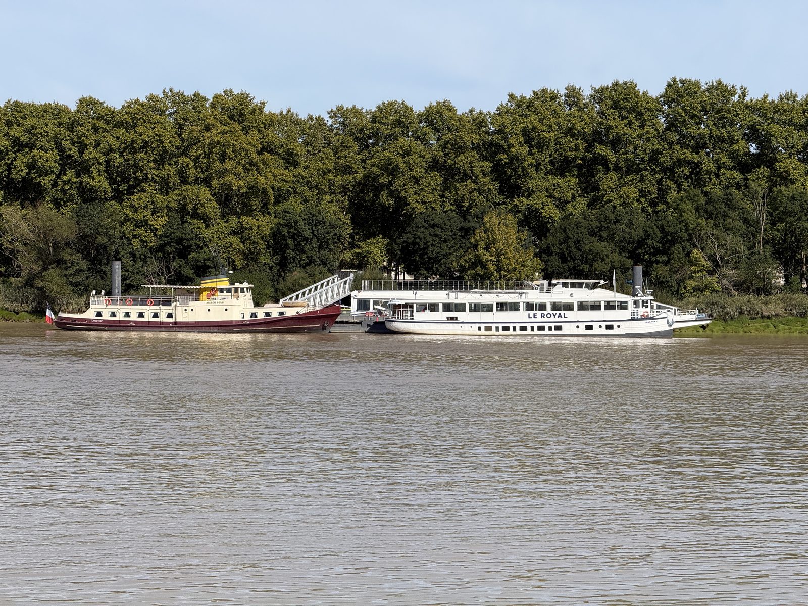 The riverboats Marco Polo and Le Royal moored along the Garonne.